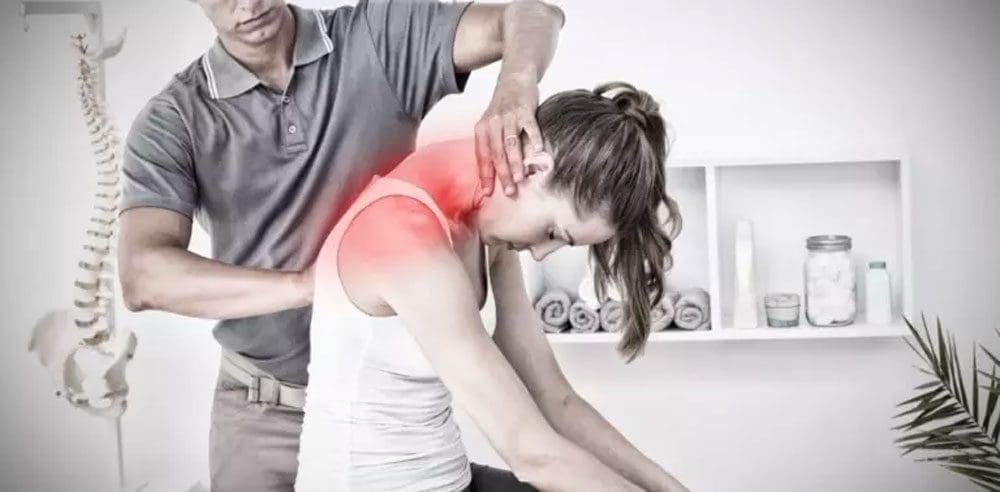 A Portland chiropractor is treating a woman to manage her pain.