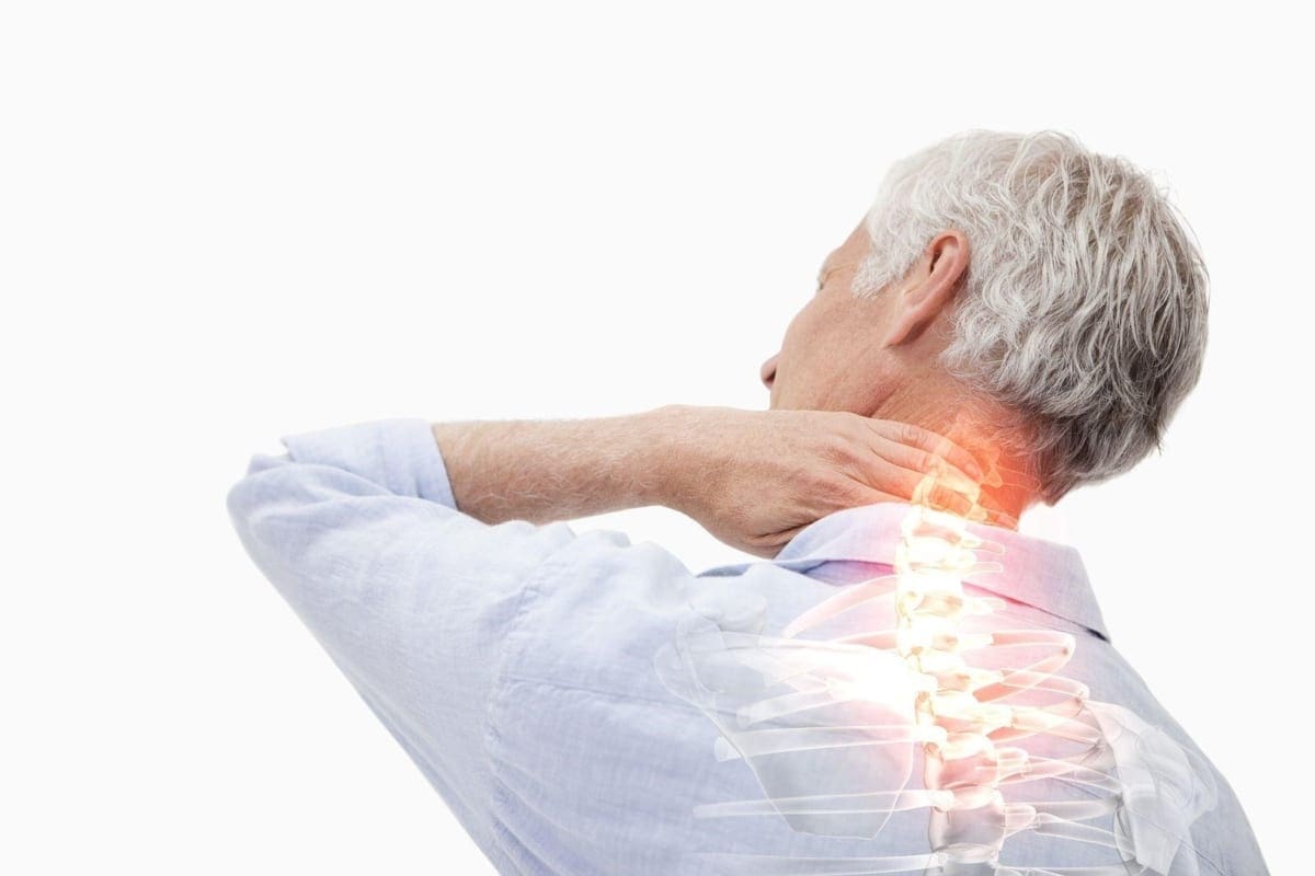 A man is suffering from neck pain after an accident.