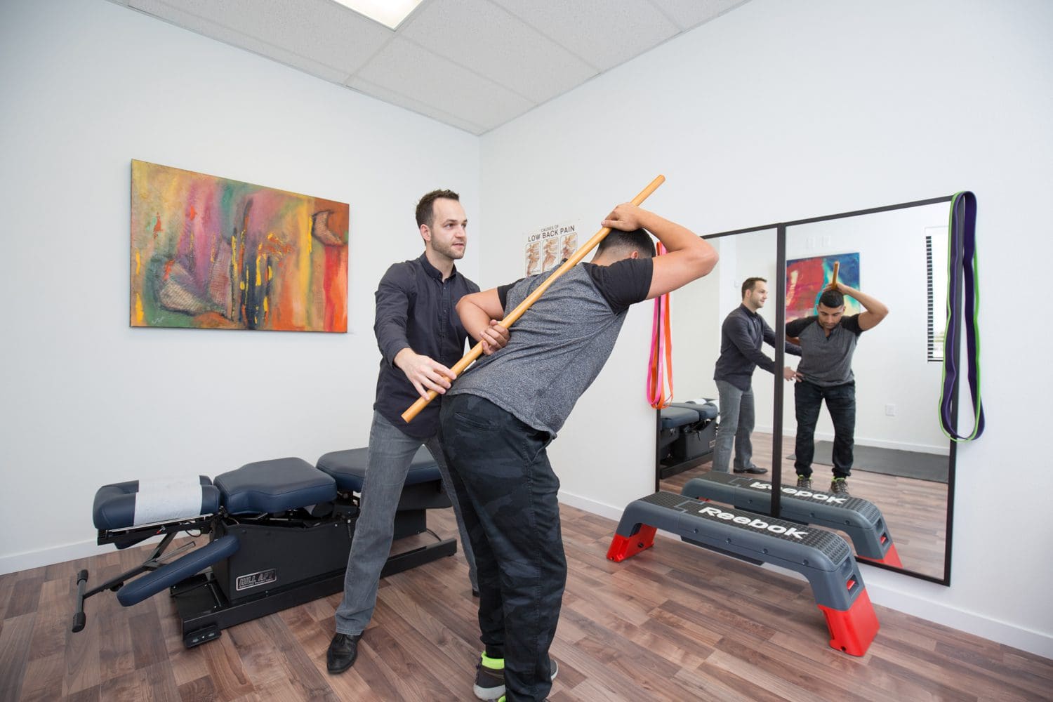 A man participates in rehab exercises at Accident Care Chiropractic