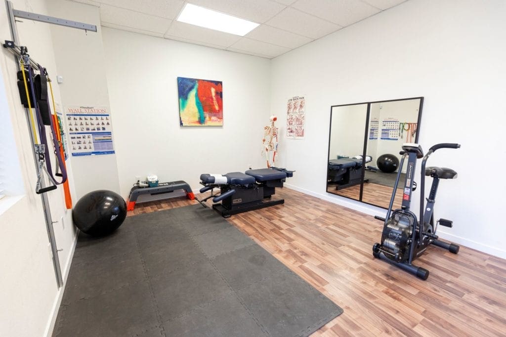 Tigard Chiropractic's physical therapy room with exercise and rehabilitation equipment.