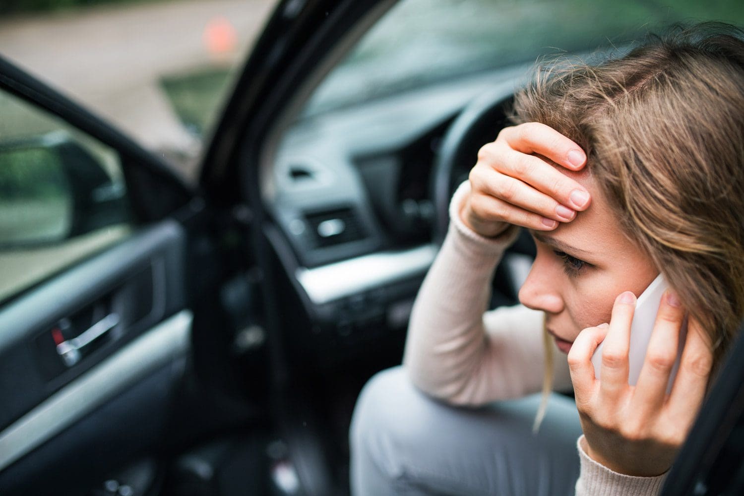 A woman calls Accident Chiropractic Care after being in a car accident.