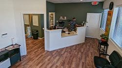 Tigard Chiropractic Clinic reception front desk and waiting room.