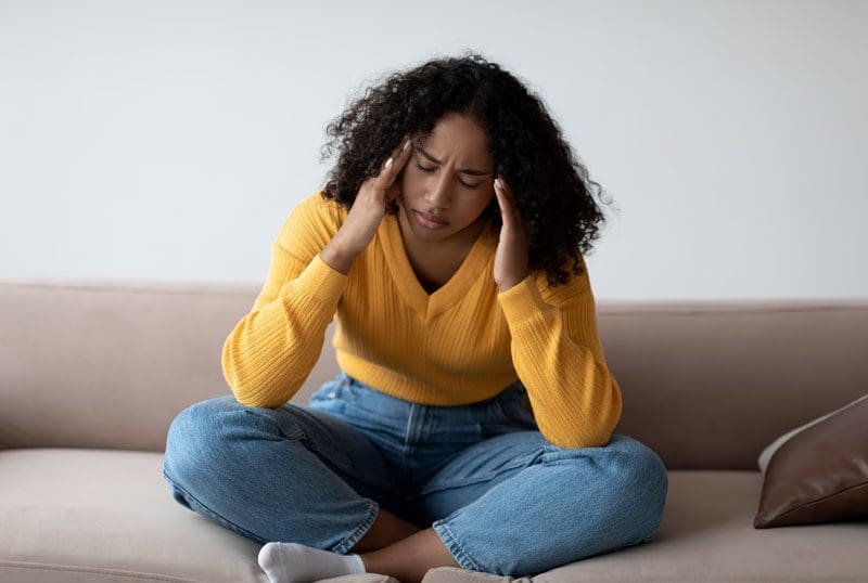 A woman appears depressed because of post traumatic stress. Therapy