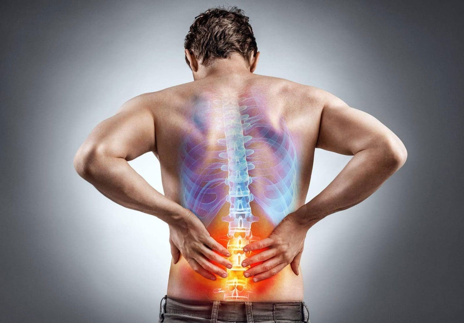 An image of the spine is transposed on top of a photograph of a man's back, to show how causes of back pain.