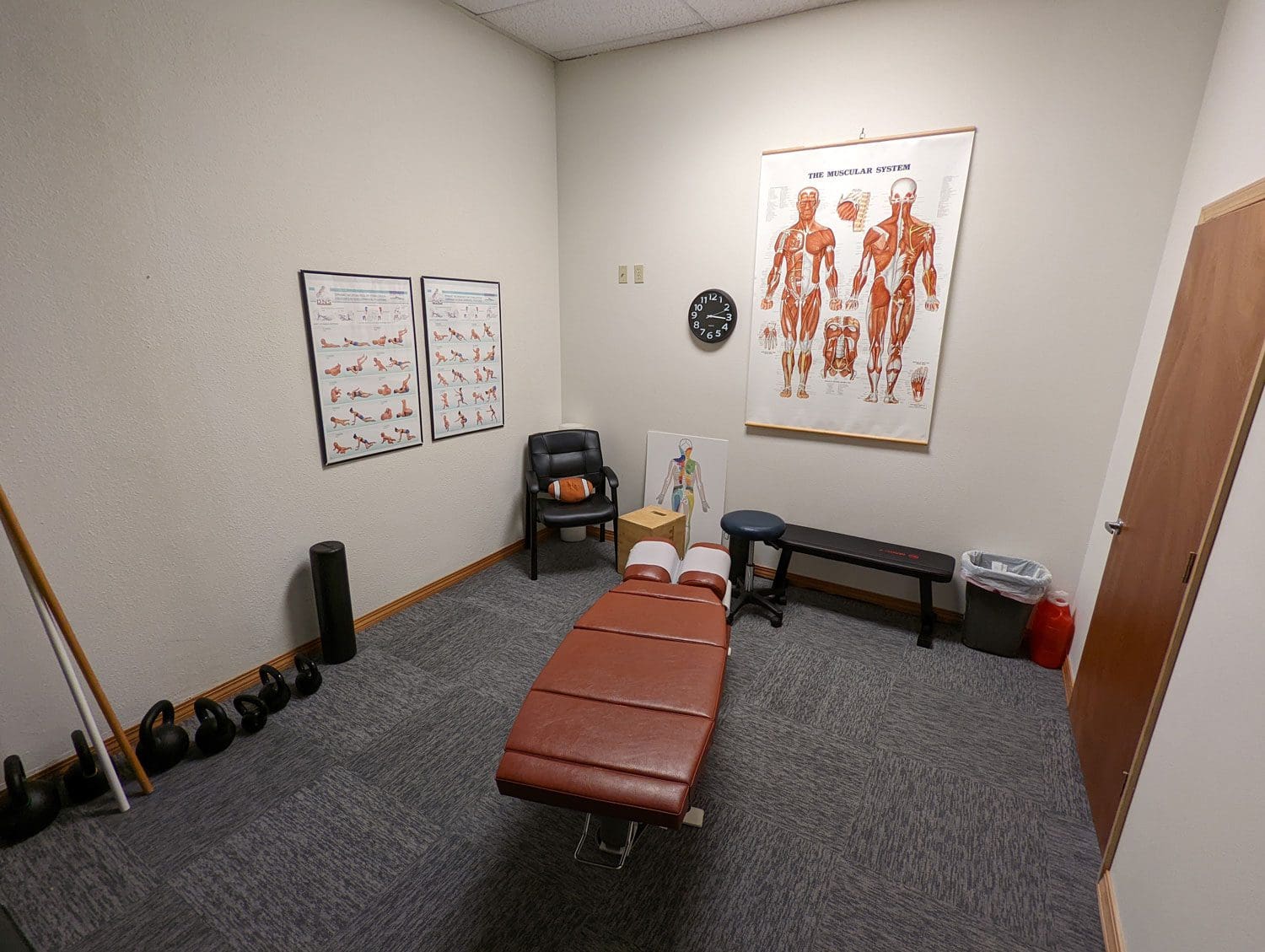 A treatment room with a chiropractic adjustment table at Beaverton Chiropractic clinic.