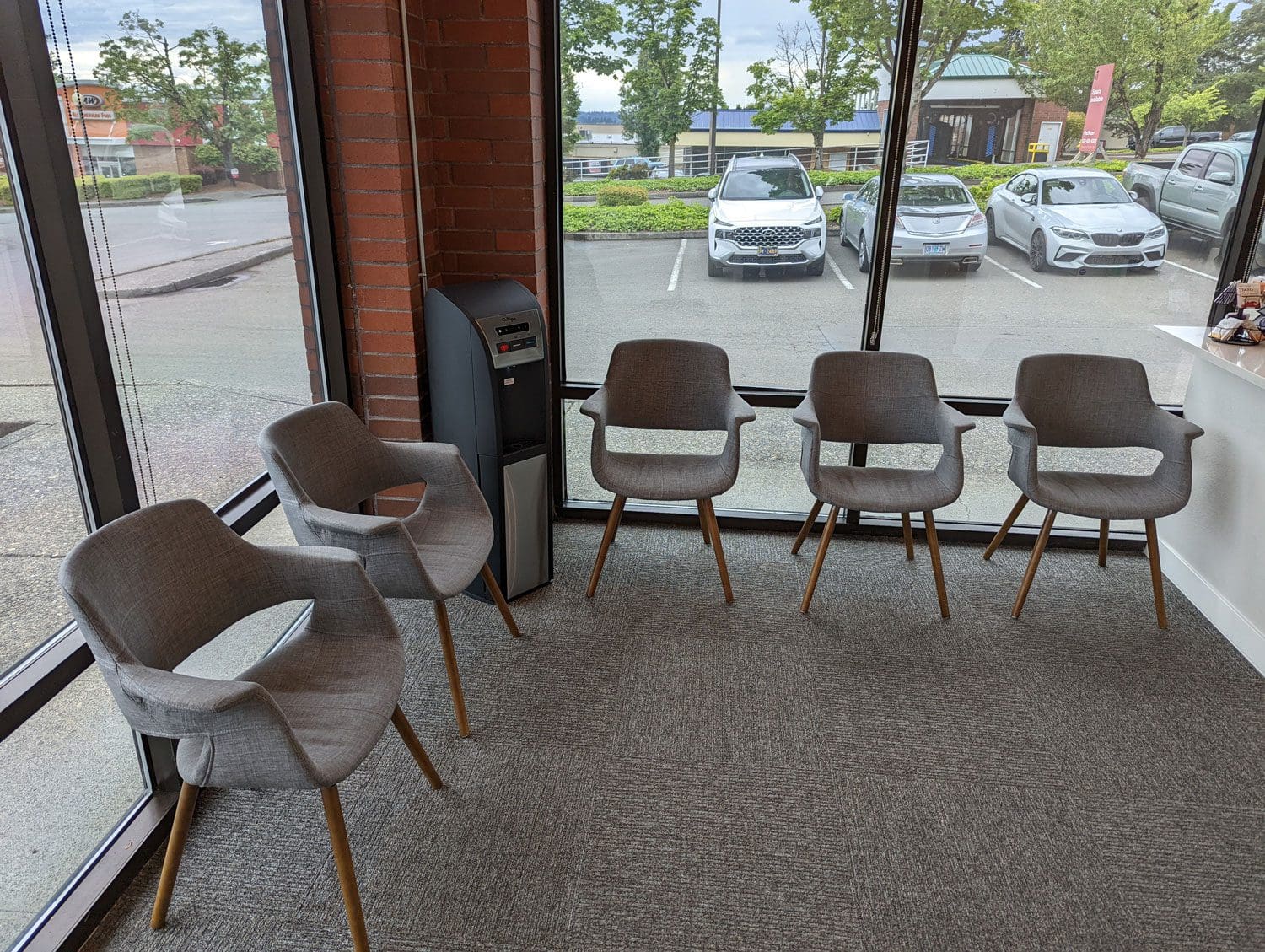 Clackamas Chiropractic Clinic reception area with large windows.