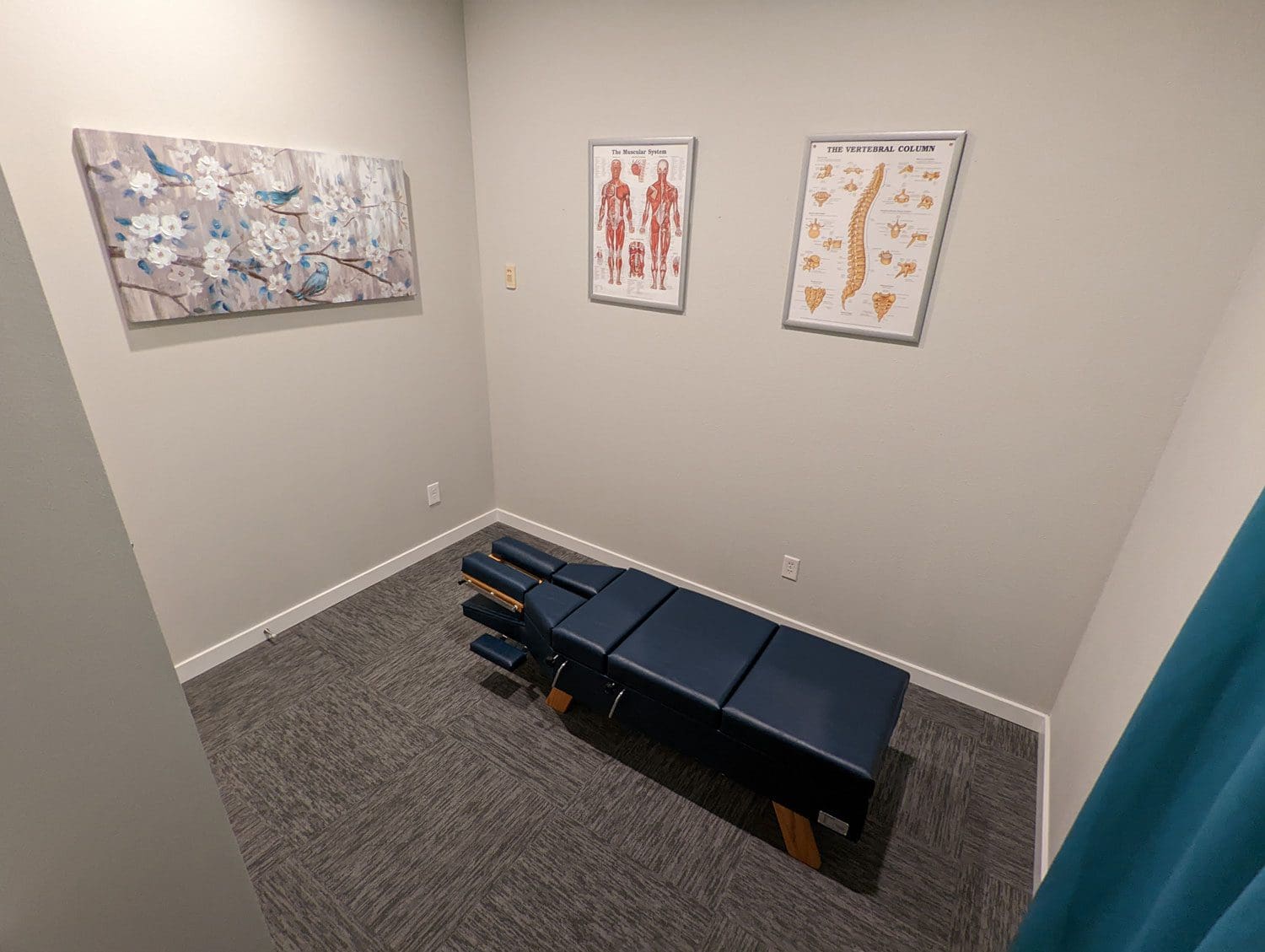 East Vancouver Chiropractic treatment room with adjustment table.