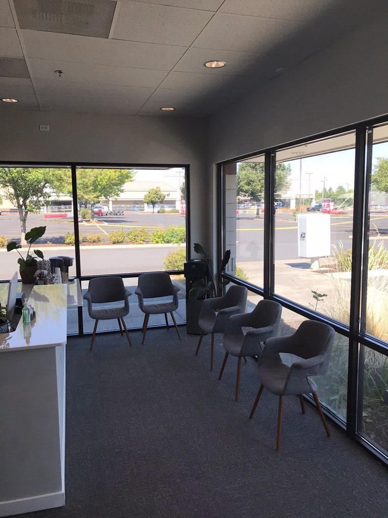 Bend Chiropractor Clinic front waiting area for patients with chairs