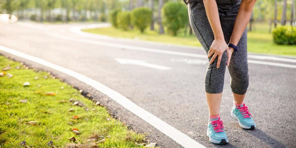 A woman has stopped jogging because of joint pain in her knee.