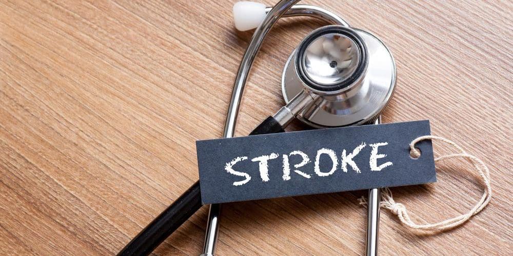 A stethoscope, and a sign that says "stroke".