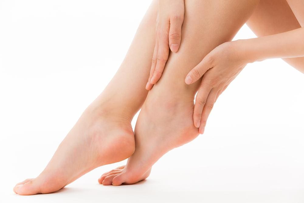 A woman's heel is feeling much better after chiropractic treatment. 