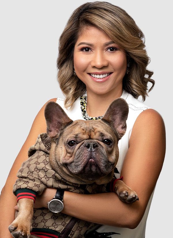 Dr. Alexis Lee, D.C. - Chiropractor Portland holding her dog Yoda.