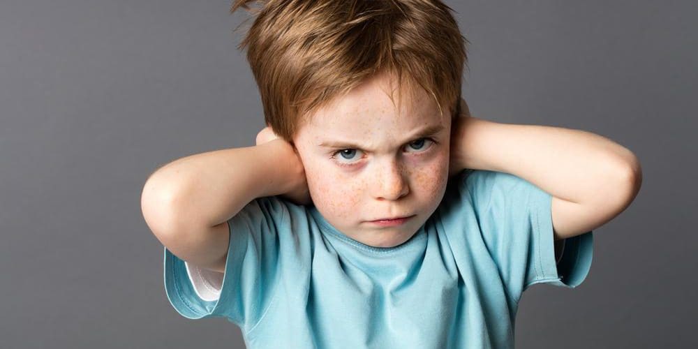 A young boy is angry.