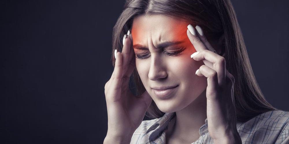 A woman is suffering from an occipital neuralgia headache.